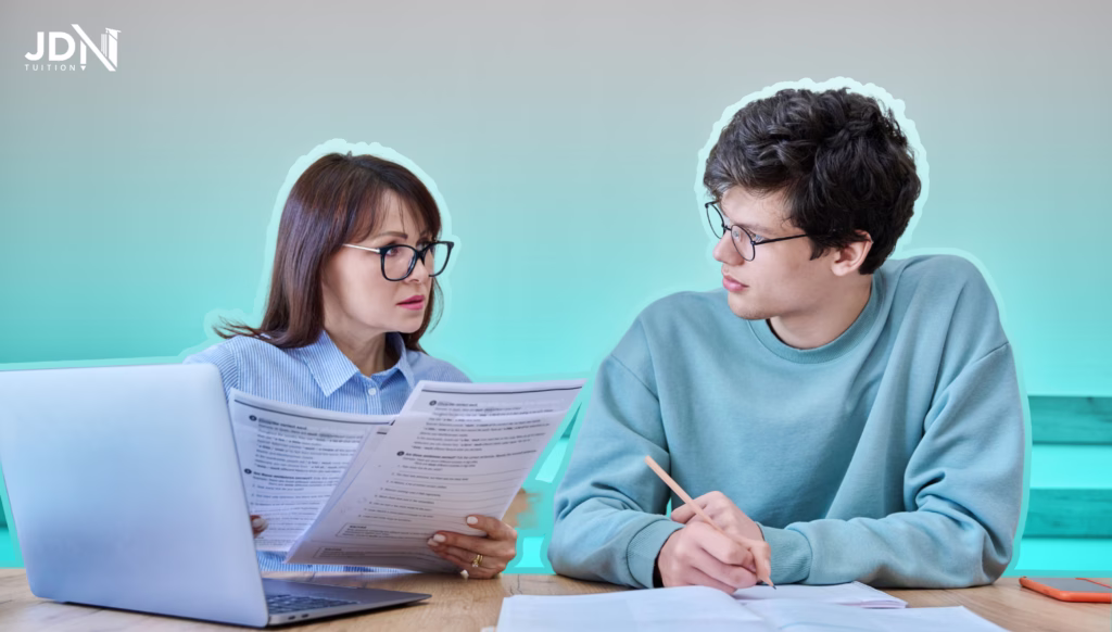 A senior student working with an in-home tutor on past papers.