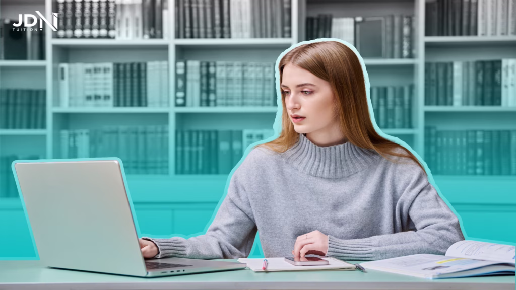 A student using AI on a laptop to brainstorm, with their own notes beside them.